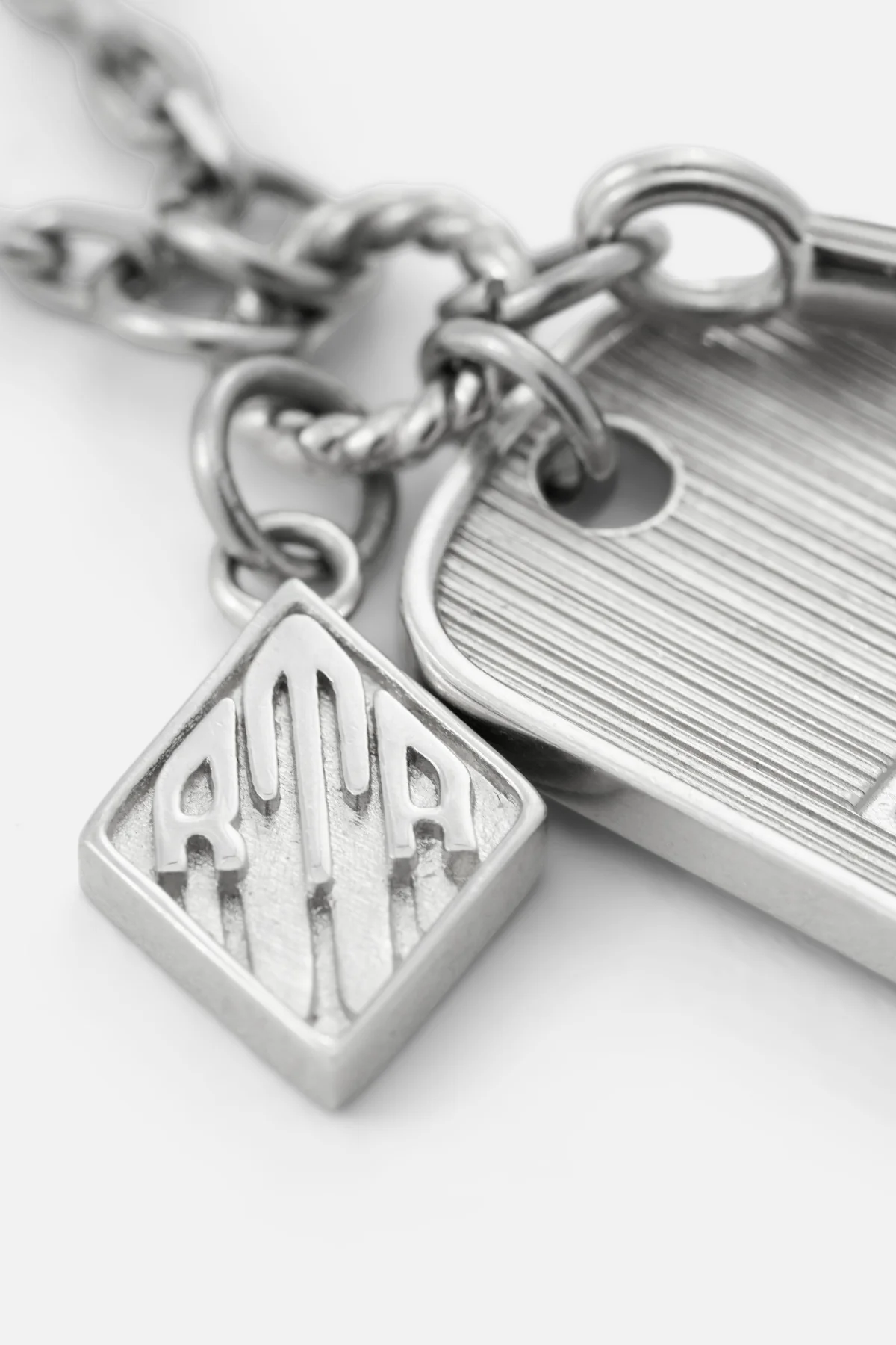 RION CHARM TAG NECKLACE | SILVER MULTI CHARM - Image 3